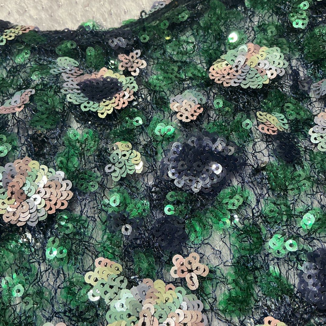 Sparkly Sequins Floral Mesh Cami Top (Category: Sleeveless) located in Manila. Submitted by daisyparl (Listing ID 1463259272, Image 2). Description: - Green mesh cami top - Floral sequin details - Thin spaghetti straps - Flattering peplum hem - Ideal for parties or a night out - Very eye-catching design - Versatile: pair with jeans or a skirt.