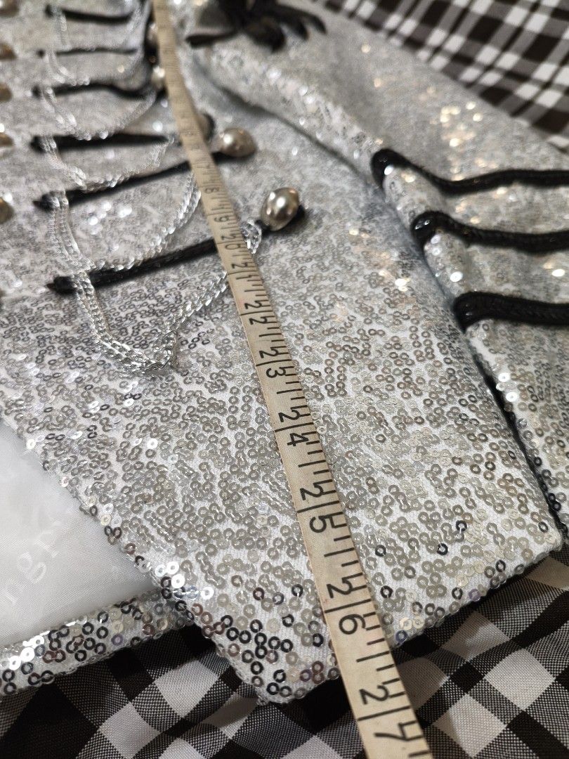 Sparkly Silver Sequin Steampunk Military Blazer (Category: Coats, Jackets and Outerwear) located in Paranaque City. Submitted by leinad333 (Listing ID 1463243587, Image 2). Description: Width: 15 Full Length: 26 Sleeve Length: 22 pwedeng pwede sa kids or sa mga 5 ft person na slim RFS: Decluttering.