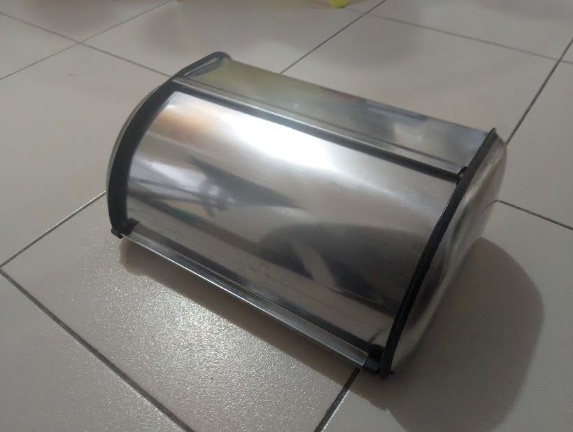 Stainless steel bread box (Category: Cookware & Accessories) located in Quezon City. Submitted by susmaryosep1 (Listing ID 1463255853, Image 1). Description: Stainless steel bread box to keep bread fresh - Easy access with roll-top lid - Sleek design complements any kitchen counter - Ideal for storing bread, pastries, and baked goods 1k.