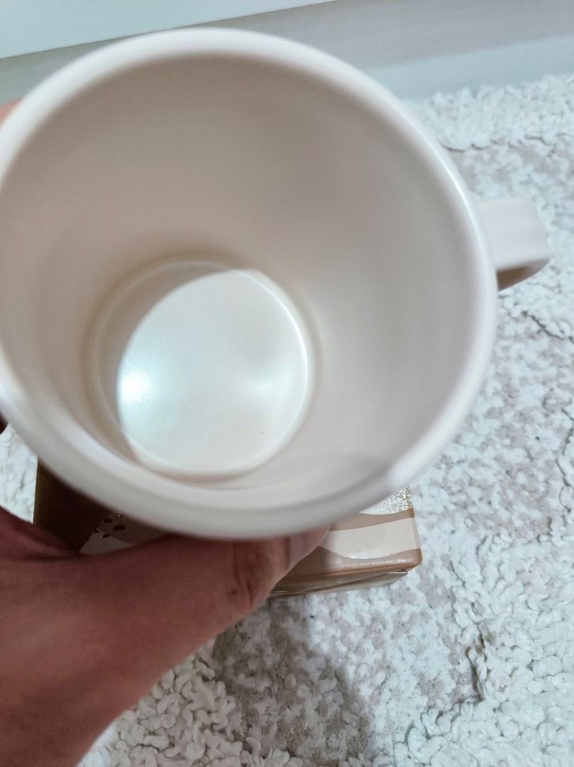 Starbucks Mug with Box 12 fl oz / 355 mL (Category: Coffee & Tea Tableware) located in Caloocan City. Submitted by adidaszler (Listing ID 1463129826, Image 2). Description: - Starbucks Mug - Capacity: 12 fl oz (355 mL) - Material: Porcelain - Microwave and Dishwasher Safe - Includes Original Box - Ideal for coffee or tea.
