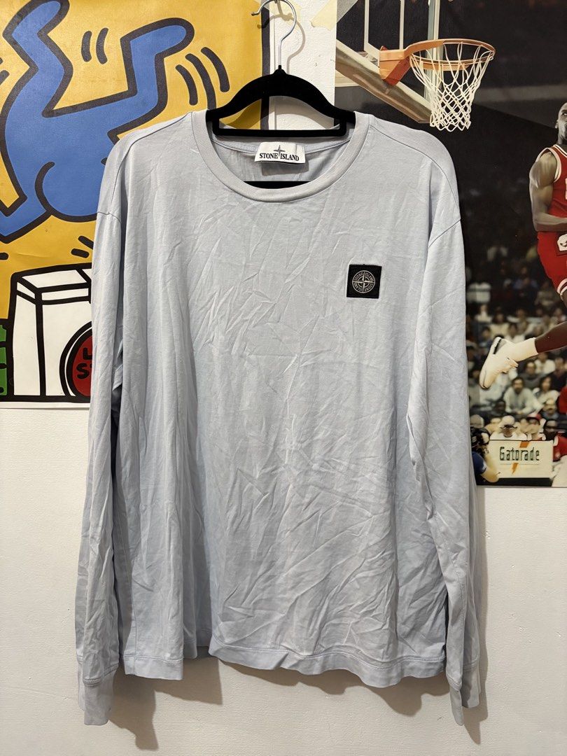 Stone Island (Category: Coats, Jackets and Outerwear) located in Echague. Submitted by jake_rc (Listing ID 1463243882, Image 1). Description: Stone Island Longsleeve Shirt Large on tag Dimes 21.5 x 26 Color light blue Color rate 8/10 Issue light stains see photos Price 1,500 plus SF.