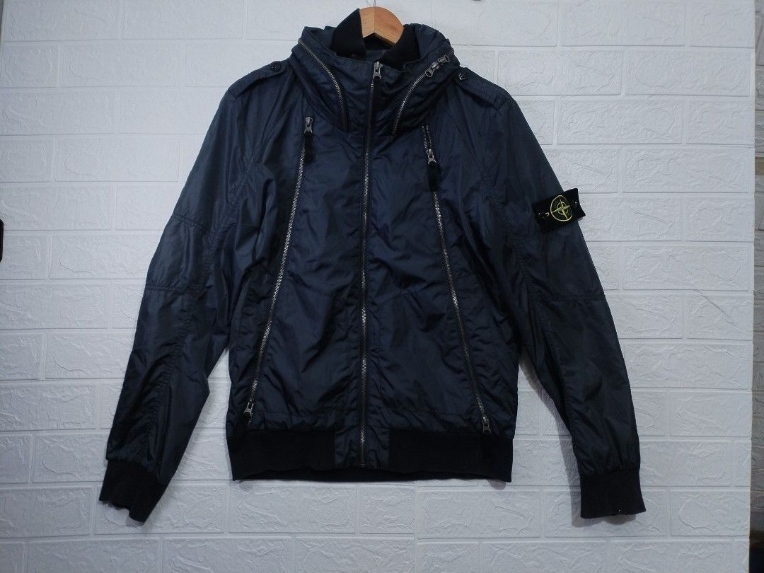 Stone Island Navy Lightweight Hooded Jacket Size L (Category: Coats, Jackets and Outerwear) located in Davao. Submitted by salupannino2016-98573 (Listing ID 1463285383, Image 1). Description: VINTAGE..! STONE ISLAND BOMBER JACKET LARGE ON TAG WIDTH..21 LENGTH..27 MADE IN TURKEY USED CONDITION 5800/FREESHIP TNX ADMIN. ☺.