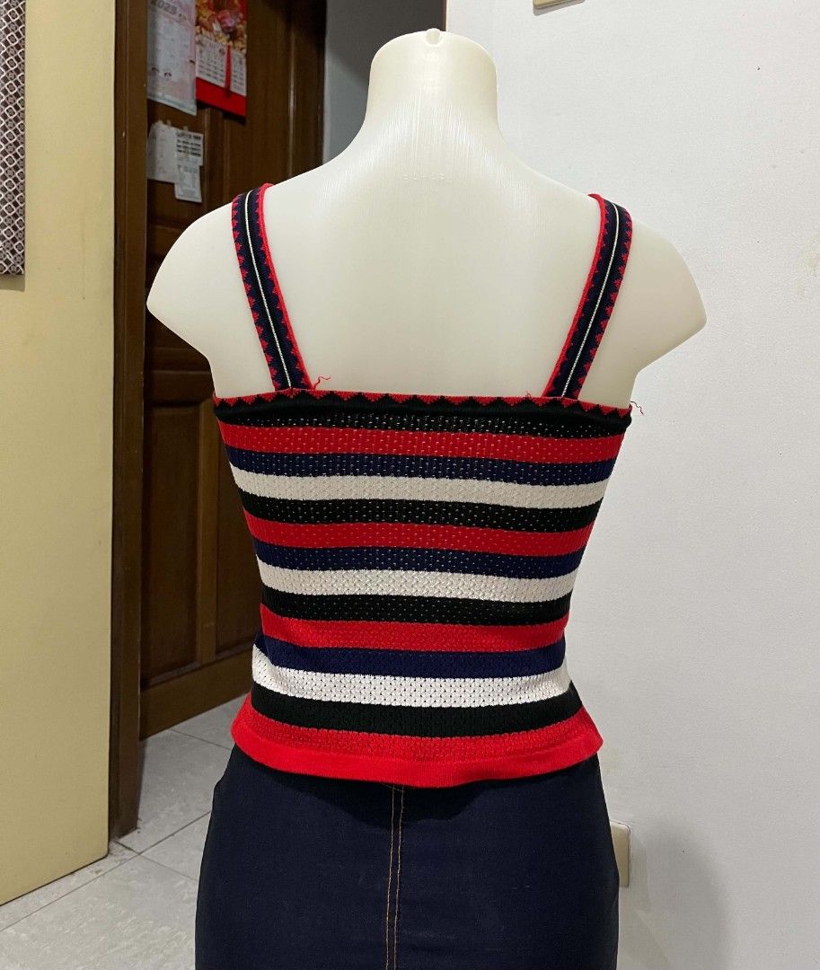 Striped Knit Corset Top with Spaghetti Straps (Category: Sleeveless) located in Quezon City. Submitted by syayayay (Listing ID 1463127051, Image 2). Description: - Red, white, blue, and black striped knit top. - Corset-style bust with spaghetti straps. - Straps feature red and black trim. - Striped back. .
