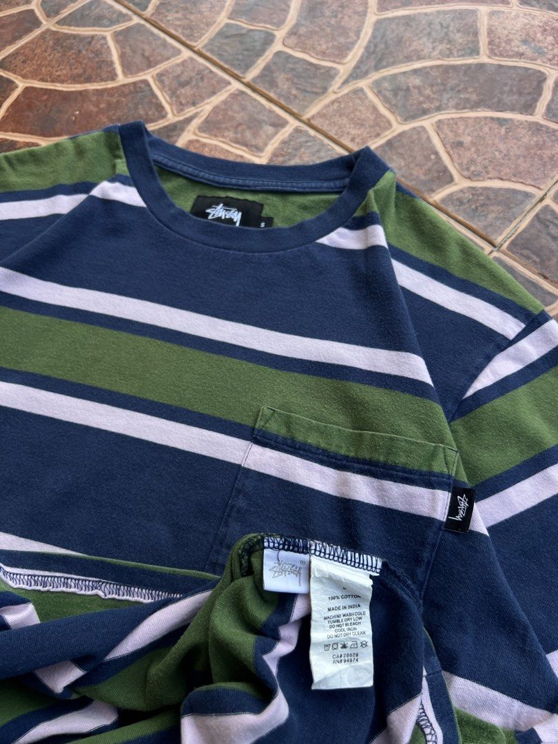 STUSSY STRIPE- POCKET (Category: Activewear) located in Batangas. Submitted by engr_thrift (Listing ID 1463190800, Image 3). Description: 📌 STUSSY STRIPE-POCKET (Small) 📐Dimension ( Inches ) Length: 25.5 Width : 20.5 Color rate: 9.5/10 Issue : 1 pinhole .