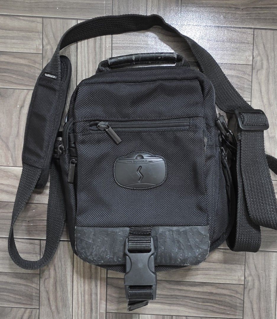 Sumdex Tactical Utility Style Sling Bag (Category: Sling Bags) located in Quezon City. Submitted by thriftstershop (Listing ID 1463281390, Image 1). Description: Brand: Sumdex Condition: Excellent Issue: PU Leather parts nababakbak na. Meet Up: Trinoma or LRT 2 Anonas Shipping: Weekdays - LBC Weekends - J&T.