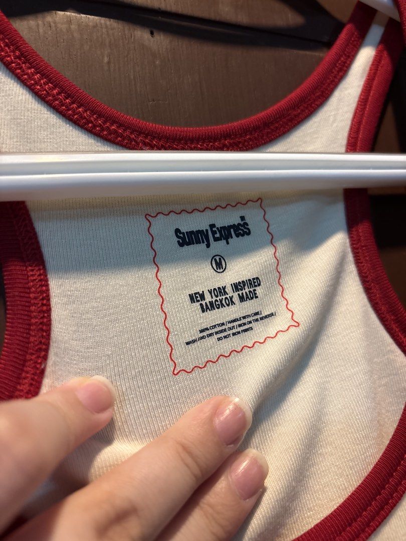 SUNNY EXPRESS — Hotdog Logo Tank (Category: Sleeveless) located in Paranaque City. Submitted by margauxm (Listing ID 1463324392, Image 2). Description: [SUNNY EXPRESS — Hotdog Logo Tank]This — In Medium size — BRAND NEW, never been used! — Bought from Loft Eyes, Sunny Express is a local Thai brand — Material is super soft, perfect for the Manila weather — No stains, runs or damage on the item, see photos! RFS: Wrong size bought :( .