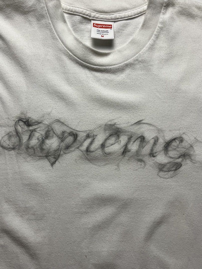 Supreme FW19 Smoke Tee (Category: Tshirts & Polo Shirts ) located in Manila. Submitted by streetsavvy (Listing ID 1463224141, Image 3). Description: Supreme FW19 Smoke Tee Size: Medium Width: 20” Length: 26” Shoulder: 17.5 Sleeve Length: 8” Hem: 21” Measured in Inches Condition: Very good condition with signs of wear Flaw: Minor lints (removable) Made in U.S.A. 100% Cotton.