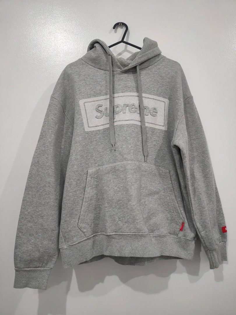 Supreme Grey Hoodie Size L (Category: Hoodies) located in Quezon City. Submitted by maxsab (Listing ID 1463203452, Image 1). Description: - Authentic Grey Supreme Hoodie - Size: Large (L) - Iconic front box logo design - Small red Supreme tag detail on sleeve and hem - Material: 100% Cotton - Origin: Made in Korea.