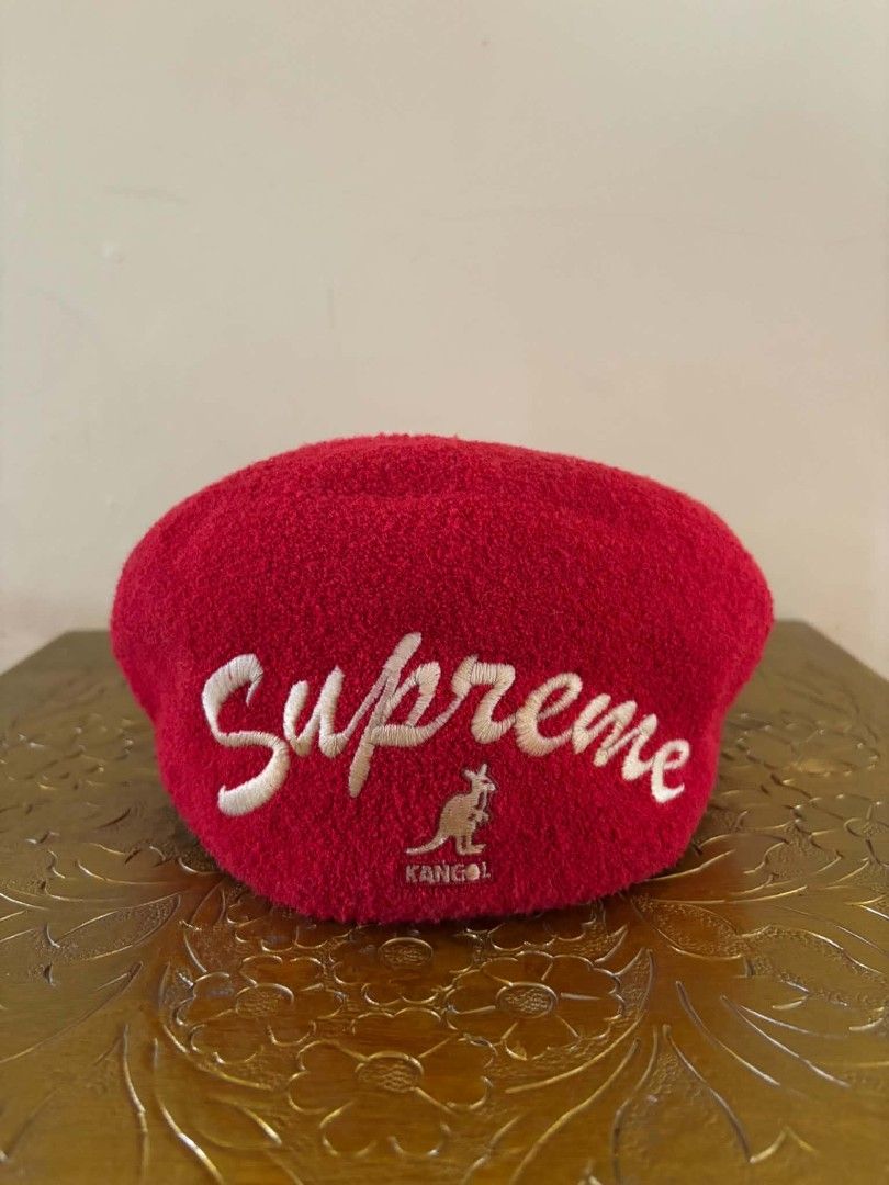 Supreme Kangol Red Beret Hat Medium (Category: Caps & Hats) located in Daet. Submitted by jemotovlog28 (Listing ID 1463284908, Image 1). Description: - Authentic Red Supreme x Kangol Beret Hat - Material: Modacrylic, Acrylic, Nylon blend - Size: Medium - Features iconic Supreme logo and Kangol kangaroo emblem - Ideal for elevating any streetwear look - A must-have addition to your hat collection.