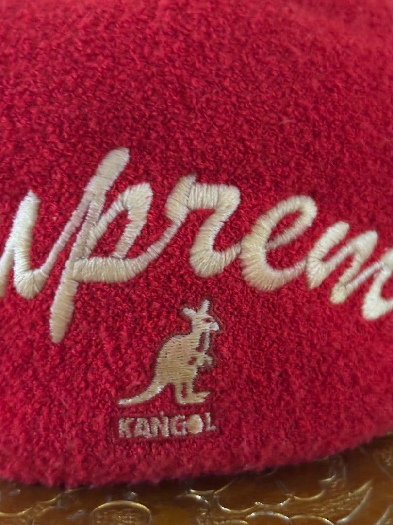 Supreme Kangol Red Beret Hat Medium (Category: Caps & Hats) located in Daet. Submitted by jemotovlog28 (Listing ID 1463284908, Image 2). Description: - Authentic Red Supreme x Kangol Beret Hat - Material: Modacrylic, Acrylic, Nylon blend - Size: Medium - Features iconic Supreme logo and Kangol kangaroo emblem - Ideal for elevating any streetwear look - A must-have addition to your hat collection.