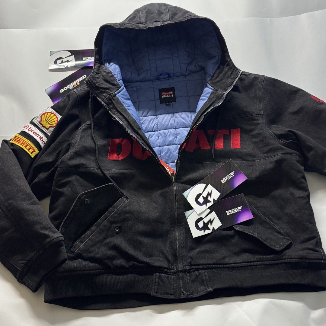 Supreme x Ducati Hooded Racing Jacket (Category: Coats, Jackets and Outerwear) located in Manila. Submitted by godspeedmnl (Listing ID 1463153301, Image 3). Description: Supreme x Ducati Hooded Racing Jacket 15,589PHP / Sizes: S, M, L, XL Colorway: Denim/Black, Denim/Washed Blue (Feel free to message me for additional photos.) Package included: • Supreme/Ducati Hooded Racing Jacket x 1 • Godspeed Mnl Paper Bag • Godspeed Mnl logo & streetwear sti