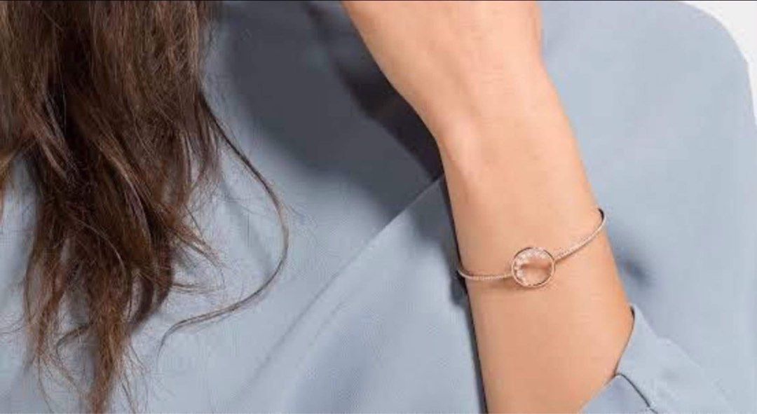 Swarovski Bracelet (Category: Bracelets) located in Quezon City. Submitted by liezl.marie (Listing ID 1463163026, Image 3). Description: New Authentic Swar0vsk! North Bangle featuring a rose gold-tone plated finish. 4500 Open for layaway. Disclaimer: We are not affiliated, associated, authorized, endorsed by or in any way officially connected with any other company or luxury brand. All copyrights are reserved to the original brand..