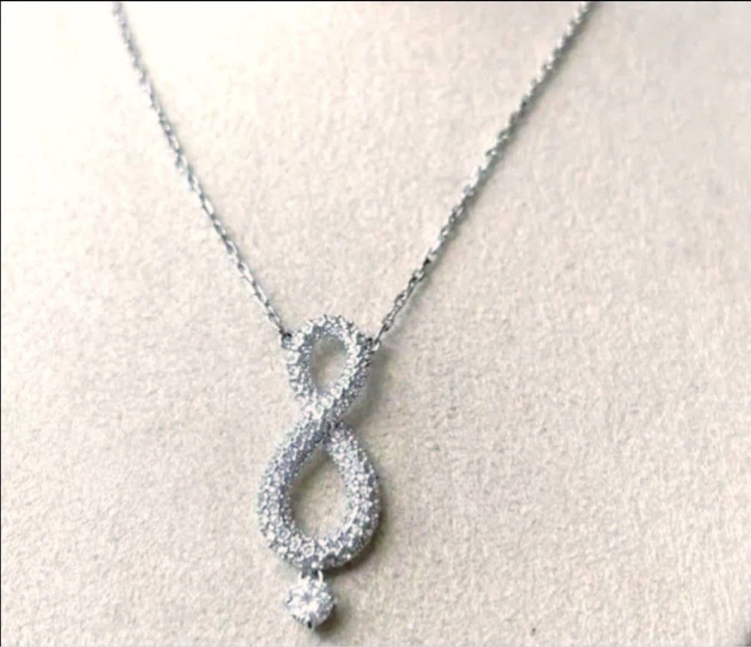 Swarovski Infinity Necklace (Category: Necklaces) located in Quezon City. Submitted by liezl.marie (Listing ID 1463163658, Image 3). Description: Swar0vski Infinity Necklace - A rhodium-plated infinity symbol embellished with white crystals and a dangling stone. 4,800 Open for layaway. Disclaimer: We are not affiliated, associated, authorized, endorsed by or in any way officially connected with any other company or luxury brand. All copyrights ar