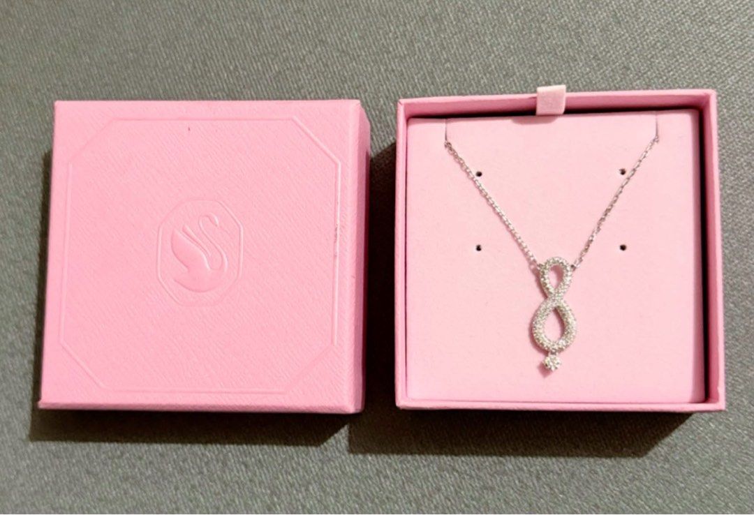 Swarovski Infinity Necklace (Category: Necklaces) located in Quezon City. Submitted by liezl.marie (Listing ID 1463163658, Image 1). Description: Swar0vski Infinity Necklace - A rhodium-plated infinity symbol embellished with white crystals and a dangling stone. 4,800 Open for layaway. Disclaimer: We are not affiliated, associated, authorized, endorsed by or in any way officially connected with any other company or luxury brand. All copyrights ar