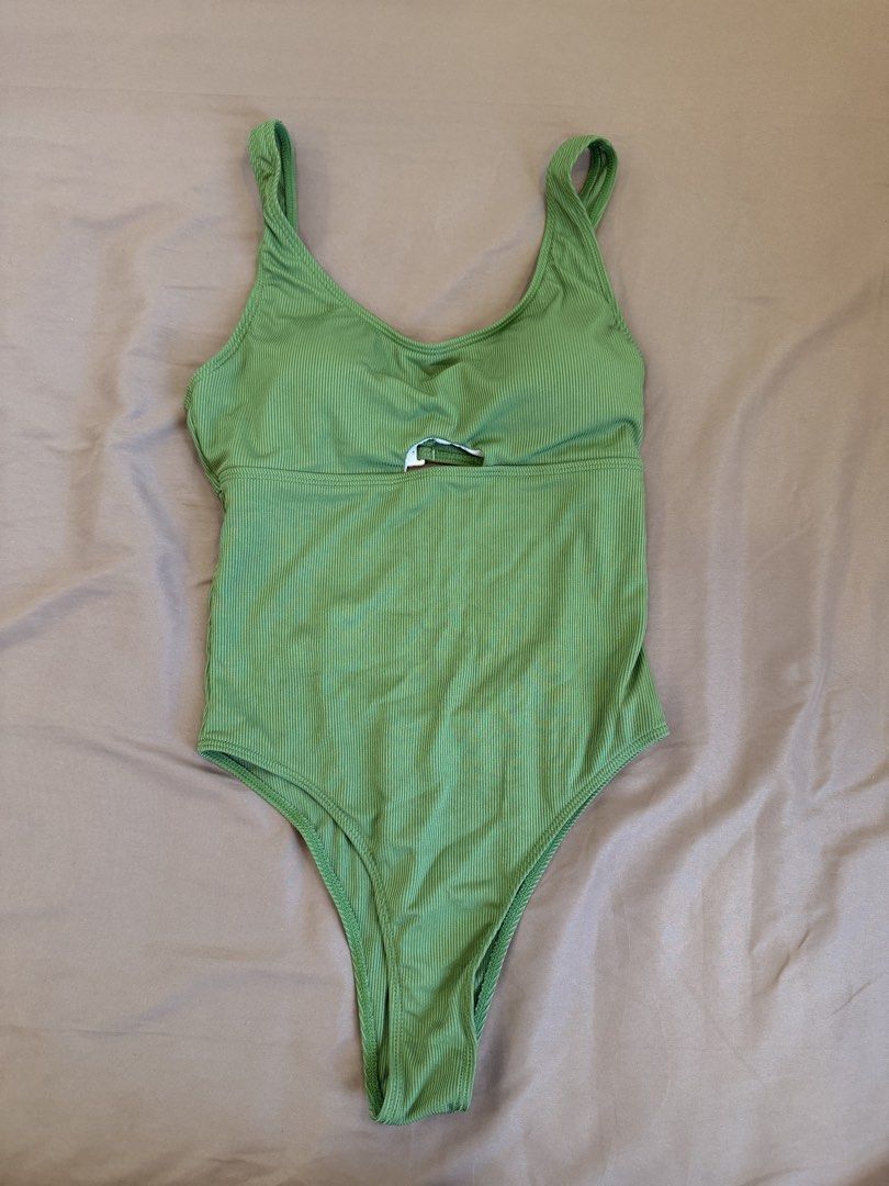 SwimChieca Green Ribbed One-Piece Swimsuit (Category: Bikinis & Swimsuits) located in Bulacan. Submitted by preloved_bygrace (Listing ID 1463125243, Image 3). Description: WASHED AND FITTED ONLY. Not my style - Flattering square neckline with a stylish bust cutout - Open back design with a secure clasp closure Note: Color may vary due to lighting. RFS: decluttering, need funds *Buyer shoulders the SF (J&T or Lalamove) **Can offer discounts if you