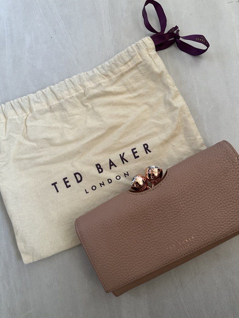 Ted Baker London Wallet (Category: Wallets & Card holders) located in Quezon City. Submitted by kianabanq (Listing ID 1463247827, Image 1). Description: Ted Baker London Pink Leather Wallet with Rose Gold Clasp AUTHENTIC 💯 - Genuine Ted Baker London wallet - Chic pink pebbled leather - Elegant rose gold clasp with sparkling crystal details - Ample card slots for all your essentials - Secure zip pocket for coins or small items - Comes with origin