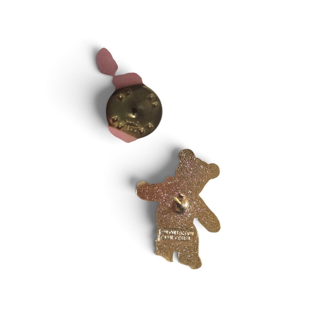 Teddy bear vintage pin (Category: Brooches) located in Ligao. Submitted by veetrinkets (Listing ID 1463250935, Image 3). Description: gold enamel, like new. vintage style with pin backing with markings.