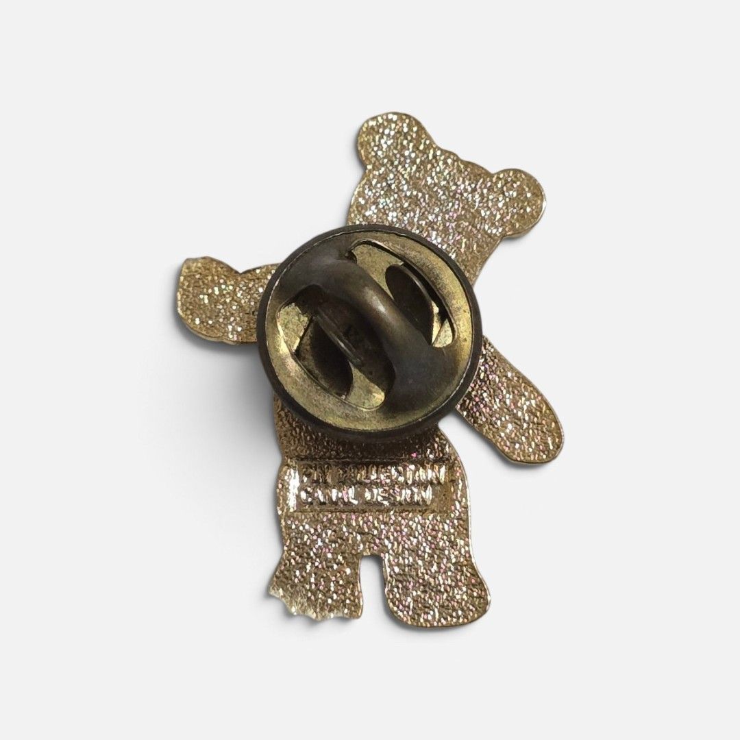 Teddy bear vintage pin (Category: Brooches) located in Ligao. Submitted by veetrinkets (Listing ID 1463250935, Image 2). Description: gold enamel, like new. vintage style with pin backing with markings.