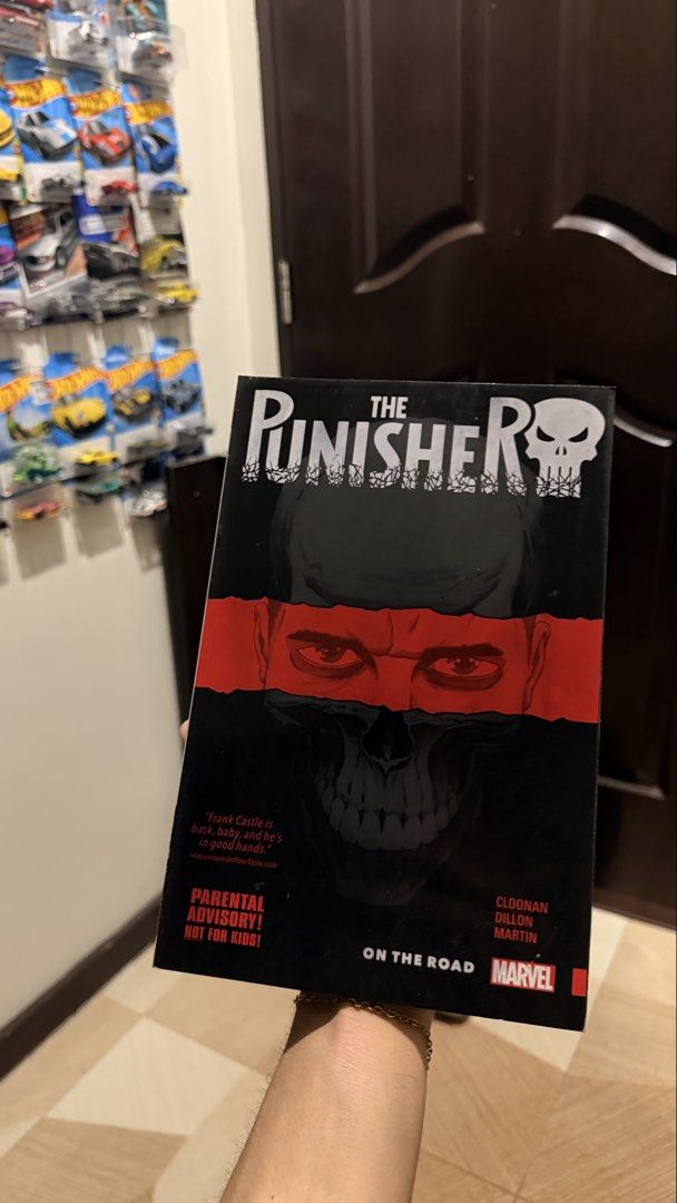The Punisher: On The Road Marvel Comic Book (Category: Comics & Manga) located in San Fernando. Submitted by goodiespin (Listing ID 1463269765, Image 1). Description: - The Punisher: On The Road comic book - Artwork by Cloonan, Dillon, and Martin - Contains a parental advisory warning (not suitable for children) - Perfect for Marvel collectors.