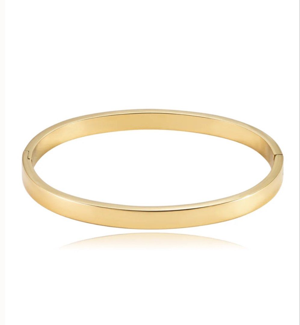 Thin Classic Bangle (Category: Bracelets) located in Quezon City. Submitted by shoppingcl (Listing ID 1463149899, Image 1). Description: • Brand new, never been worn with original packaging • Retails for ₱890, sold out online • 5.9 x 4.8cm inner diameter • 18k gold on stainless steel.
