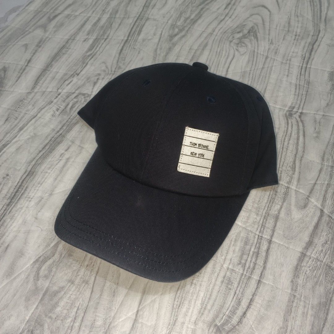 Thom Browne Cap navy blue (Category: Caps & Hats) located in Manila. Submitted by janna_m (Listing ID 1463301897, Image 1). Description: EXCELLENT CONDITION ✅ NO ISSUES ✅ DM FOR INQUIRIES 📩.