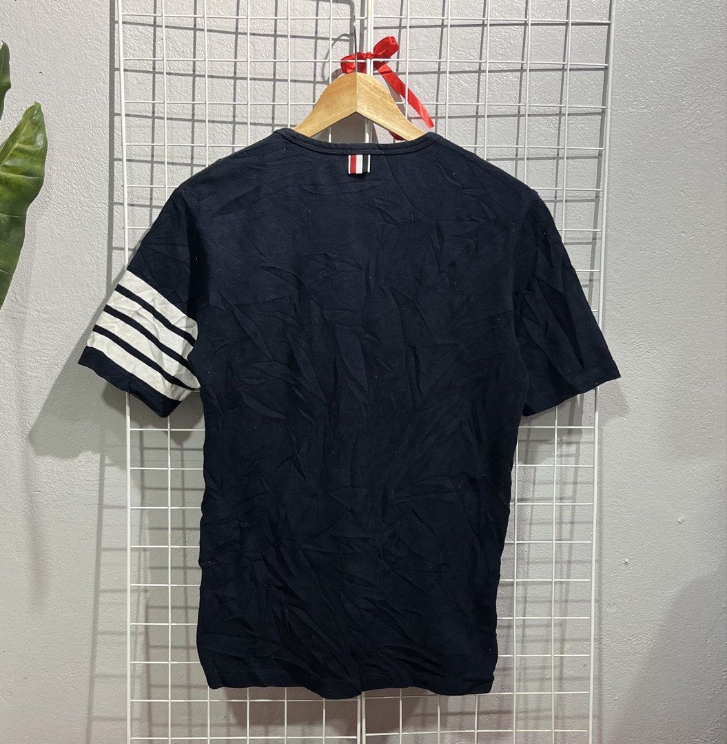 Thom Browne New York Crew Neck Tee (Category: Luxury Apparel) located in Tuguegarao City. Submitted by preowned_curation (Listing ID 1463128669, Image 2). Description: 4 Bar Sleeve Stripe Size 1 (Front length: 24, Back Length: 26 x 18.5) Minor dirt Color rate 9.5/10 Needs lightwash only 750 + SF.