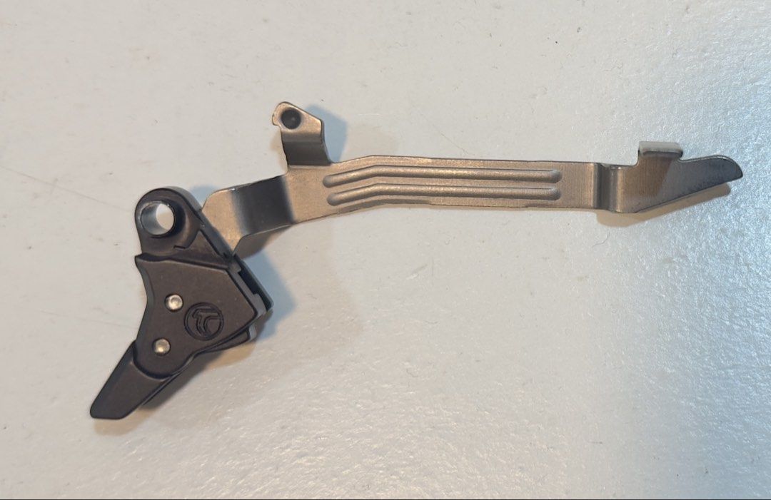 Timney Alpha Competition Trigger for Glock Gen 5 (Category: Action & Battle Toys) located in Quezon City. Submitted by eightasia (Listing ID 1463122909, Image 3). Description: - Timney Alpha Competition Trigger for Glock Gen 5 - 3 lb pull weight with pivoting safety - Factory calibrated for immediate use - Easy installation, no gunsmith required - Made in the USA - Enhances accuracy and field performance.