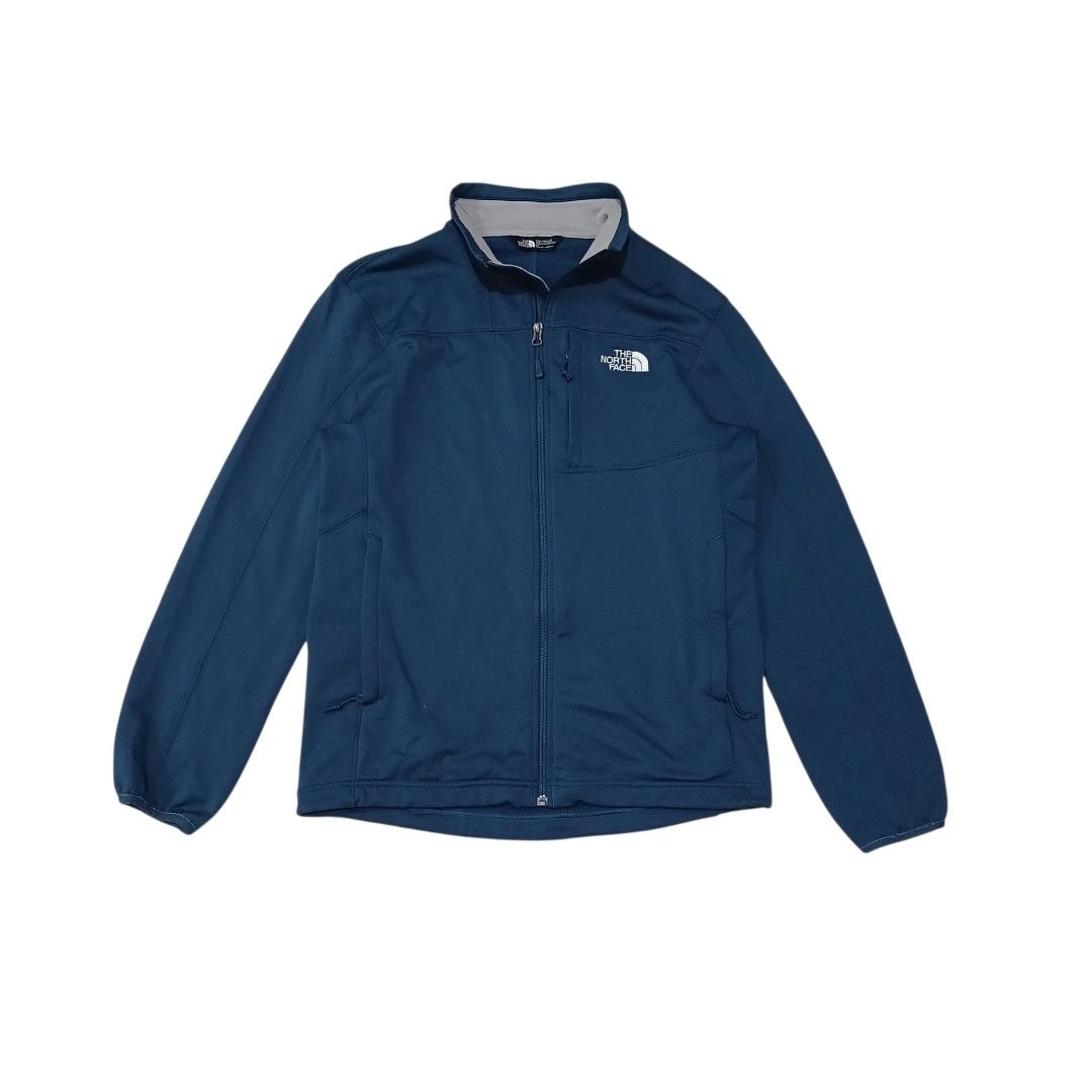 TNF SoftShell Jacket (Category: Coats, Jackets and Outerwear) located in Iloilo. Submitted by wearmovement.ilo (Listing ID 1463262954, Image 1). Description: TNF SoftShell Jacket Navy Blue Color Rate 10/10 Size Medium Men's Dimensions 20.5 Width x 26.5 Length Good as New Condition / Full Zip Three Zipper Pockets / Embroidered Logo Drawcords / Stretchable Fabric DM 📩📩📩.