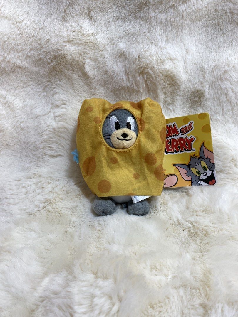 Tom and Jerry “Nibbles” Plush Charm Keychain - SEGA (Category: Plushies & Soft Toys) located in Kalibo. Submitted by ollie_stuffshop (Listing ID 1463174845, Image 1). Description: Before you send your inquiries: ❗️Last Price is already posted ❗️Manage your expectations, WYSIWYG ❗️May need washing ❗️Dropoff is every Wednesday & Sunday - Adorable Tom and Jerry plush toy - Features Tom peeking out from a cheese slice - Comes with original tags - Mad
