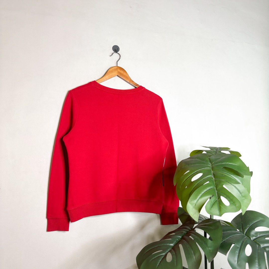Tommy Hilfiger | Sweater. (Category: Coats, Jackets and Outerwear) located in Manila. Submitted by bypiecesandstories (Listing ID 1463226078, Image 2). Description: Tommy Hilfiger | Sweater. 799 PHP 🧡 Perfect Condition Can Fit — X Small to Medium Dimensions — W 21" L 23" Tommy Hilfiger sweater featuring the brand’s signature flag design across the chest. A timeless piece with a bold look that never feels too complicated. • REMINDERS • — Read the