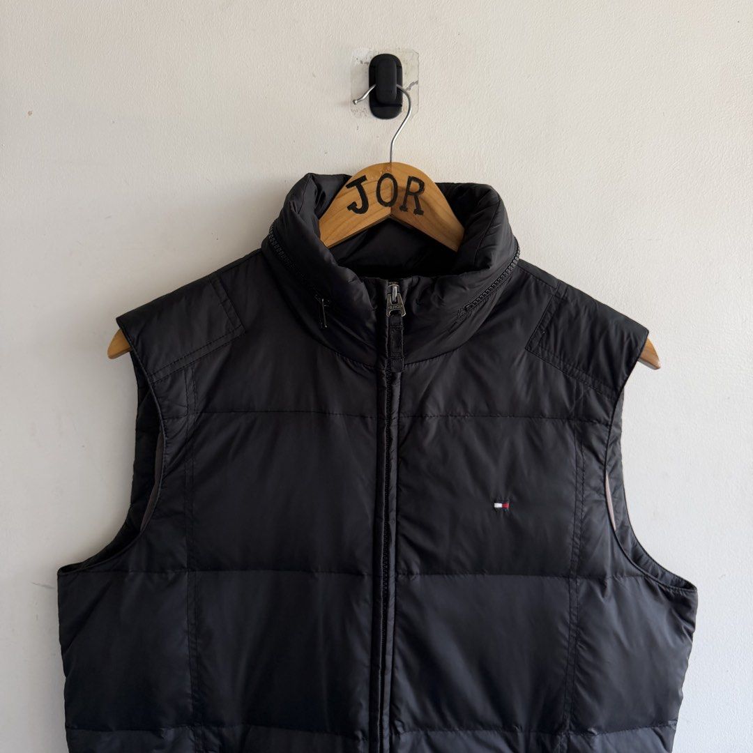 Tommy Hilfiger Puffer Vest (Category: Coats, Jackets and Outerwear) located in San Fernando. Submitted by jorjorr (Listing ID 1463199292, Image 2). Description: Tommy Hilfiger Puffer Vest Packable hood Small on tag 23 width 27 length best fit medium to large Excellent conidtion No issue P1,699.