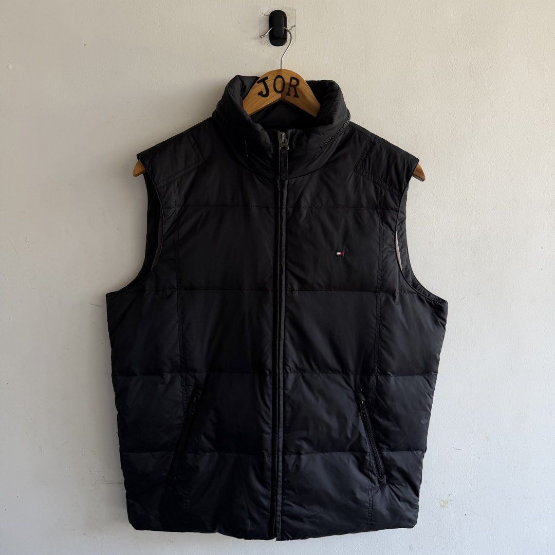 Tommy Hilfiger Puffer Vest (Category: Coats, Jackets and Outerwear) located in San Fernando. Submitted by jorjorr (Listing ID 1463199292, Image 1). Description: Tommy Hilfiger Puffer Vest Packable hood Small on tag 23 width 27 length best fit medium to large Excellent conidtion No issue P1,699.