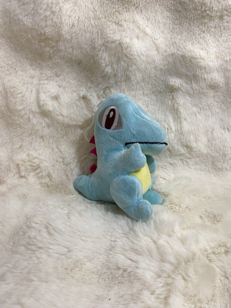 Totodile Pokemon Plush Charm Keychain (Category: Plushies & Soft Toys) located in Kalibo. Submitted by ollie_stuffshop (Listing ID 1463171263, Image 1). Description: Before you send your inquiries: ❗️Last Price is already posted ❗️Manage your expectations, WYSIWYG ❗️May need washing ❗️Dropoff is every Wednesday & Sunday - Adorable blue dinosaur plush toy - Resembles a Pokemon character - Super soft and cuddly - Approximately 6 inches tall - Ideal