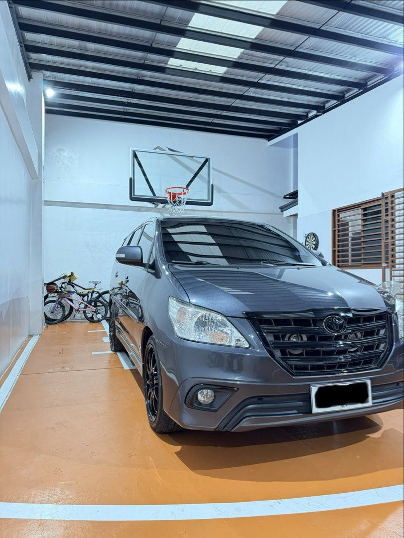 Toyota Innova (Category: Used Cars) located in Makati City. Submitted by sebastian285 (Listing ID 1463319519, Image 2). Description: 2016 Toyota Innova V (last production before face lift) - 59,000+ odo (original not tampered) - mags n tires (yokohama advan fleva 225 45 r18 with original rota fighter 10) both bought last june - installed full exhaust with borla tip and remapped by bacolod diesel - installed boost gauge and hybrid air filter by ba
