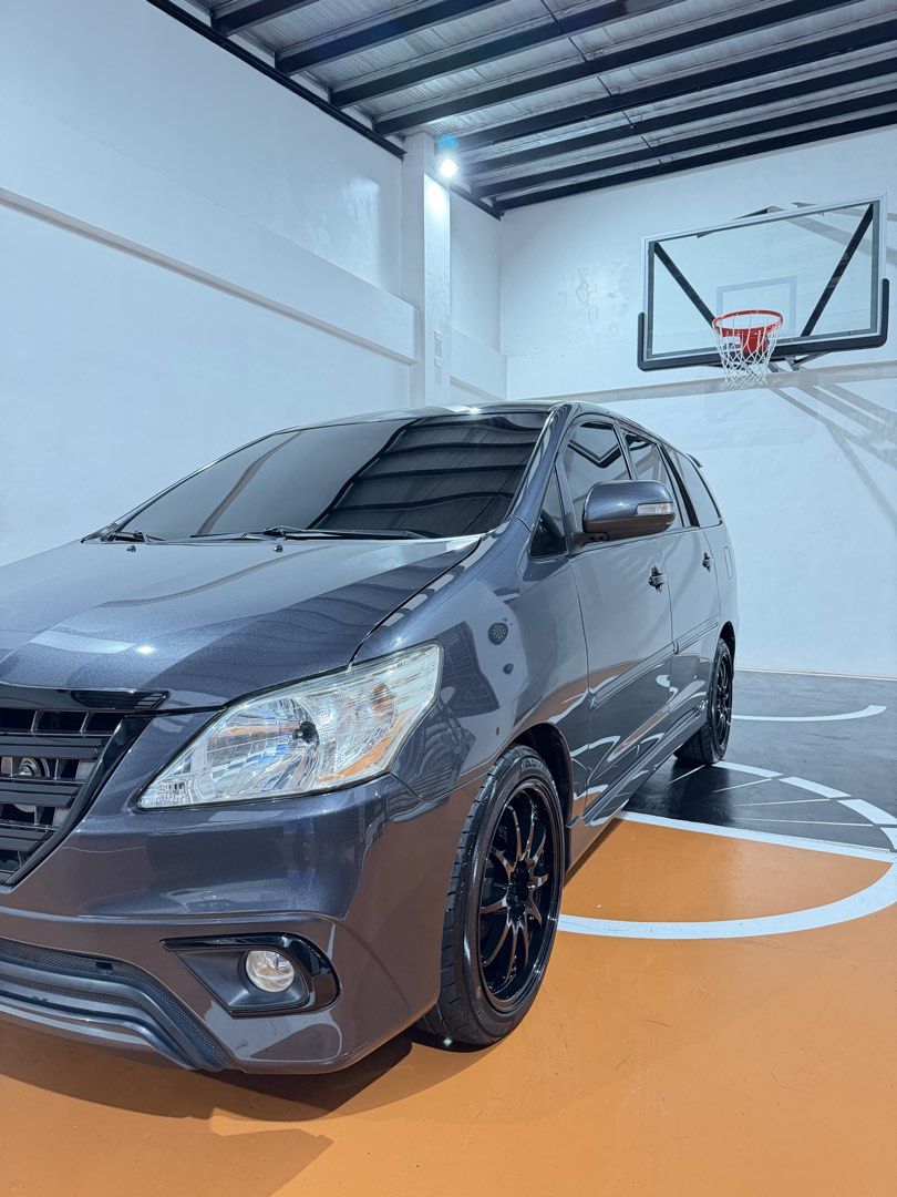 Toyota Innova (Category: Used Cars) located in Makati City. Submitted by sebastian285 (Listing ID 1463319519, Image 3). Description: 2016 Toyota Innova V (last production before face lift) - 59,000+ odo (original not tampered) - mags n tires (yokohama advan fleva 225 45 r18 with original rota fighter 10) both bought last june - installed full exhaust with borla tip and remapped by bacolod diesel - installed boost gauge and hybrid air filter by ba