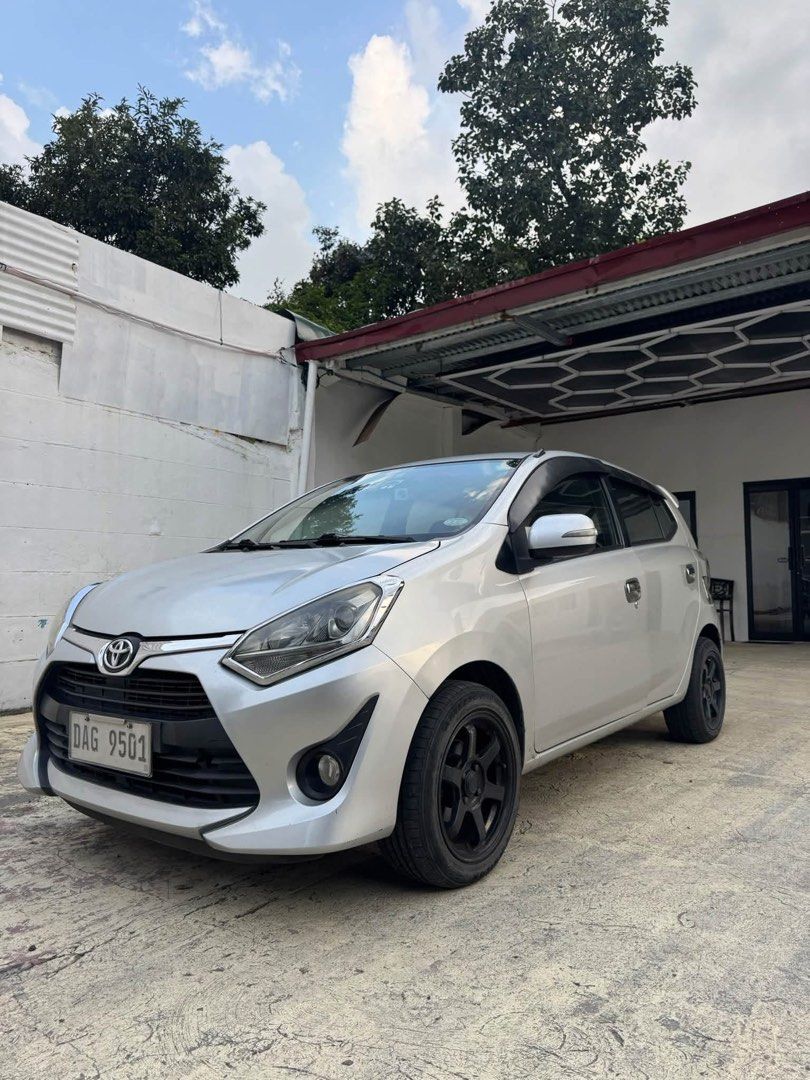 Toyota Wigo (Category: Used Cars) located in Quezon City. Submitted by altheafrnchz (Listing ID 1463316653, Image 3). Description: Toyota Wigo G 2018 — Important Details * Price: ₱375,000 cash * Financing: ₱100,000 all-in down payment * Transmission: Automatic * Mileage: Low mileage * Ownership: First owner acquired * Condition: Well-maintained interior & exterior * Modifications: Full exhaust system, RAYS Thai-copy wheels, blue tint * Use: Econo