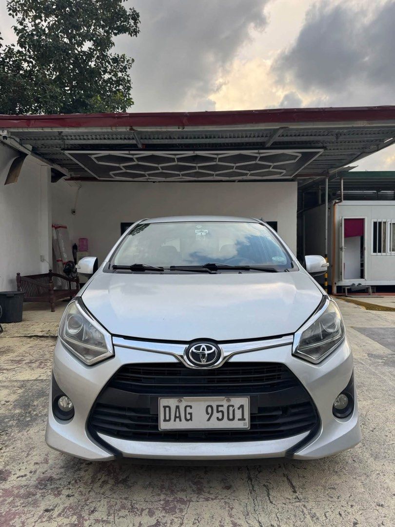 Toyota Wigo (Category: Used Cars) located in Quezon City. Submitted by altheafrnchz (Listing ID 1463316653, Image 1). Description: Toyota Wigo G 2018 — Important Details * Price: ₱375,000 cash * Financing: ₱100,000 all-in down payment * Transmission: Automatic * Mileage: Low mileage * Ownership: First owner acquired * Condition: Well-maintained interior & exterior * Modifications: Full exhaust system, RAYS Thai-copy wheels, blue tint * Use: Econo