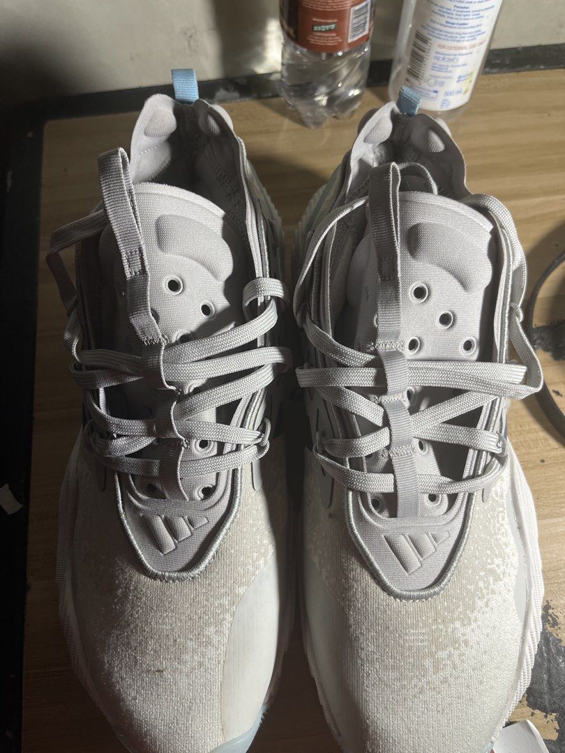 Trae young basketball shoes (Category: Sneakers) located in Quezon City. Submitted by aaapanda1131221 (Listing ID 1463285611, Image 2). Description: - Adidas shoes - US Men's Size 10 - Colorway: Light Grey & Blue - Ideal for running or training - Brand new, never worn, no box.
