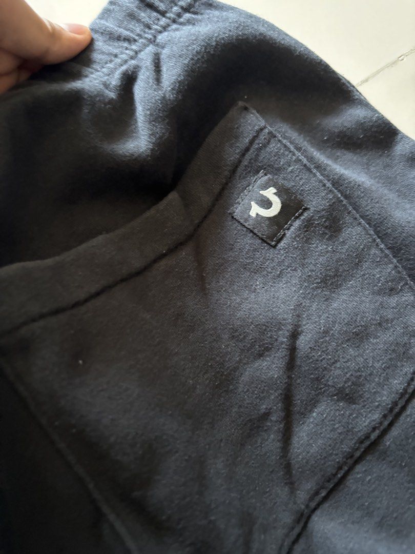 True Religion Black Sweatpants Joggers (Category: Joggers) located in Quezon City. Submitted by ginoongpablo (Listing ID 1463170335, Image 2). Description: - Black True Religion sweatpants - Elastic waistband with drawstring - Classic True Religion logo on back pocket - Large logo graphic on left leg - Comfortable and stylish for everyday wear - Ideal for lounging or casual outings.