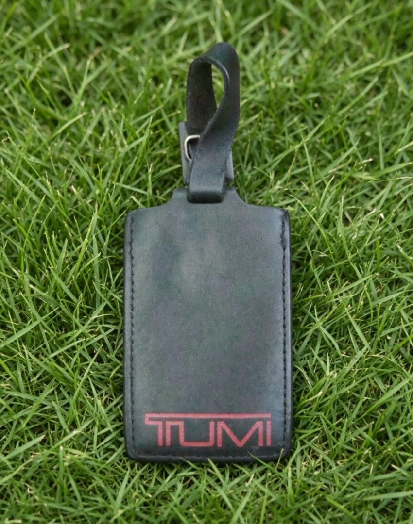 TUMI Black Leather Luggage Tag (Category: Wallets & Card Holders) located in Bulacan. Submitted by ssirc (Listing ID 1463173899, Image 2). Description: TUMI Black Leather Luggage Tag (minimal rubs and sign of usage) 780+sf‼️ DM‼️.