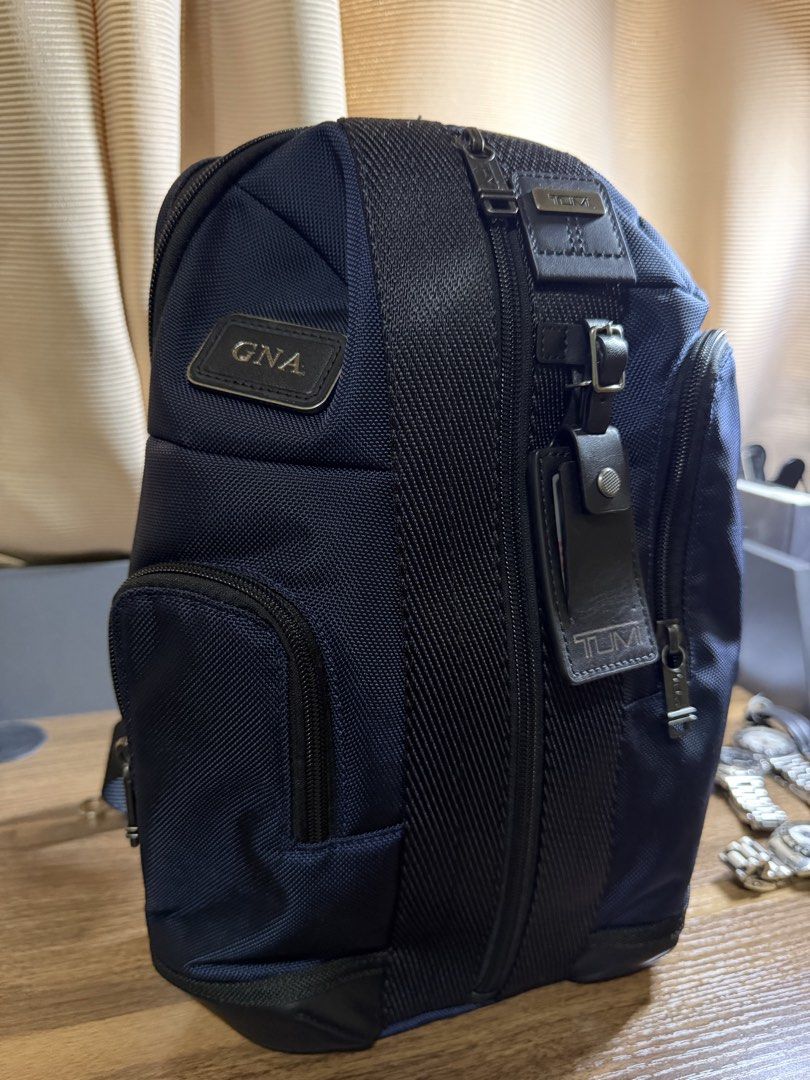 Tumi Higgins Sling (Category: Luxury Bags & Wallets) located in Quezon City. Submitted by nicoandjujie (Listing ID 1463183890, Image 1). Description: Up for sale is an authentic Tumi Higgins Sling in a Navy Blue tone. Lightly used in excellent condition. Clean interior and exterior; zippers and hardware function smoothly. Reason for selling: Bought this thinking it would fit like a lightweight sling, but it’s a bit too big for my setup. Price is 