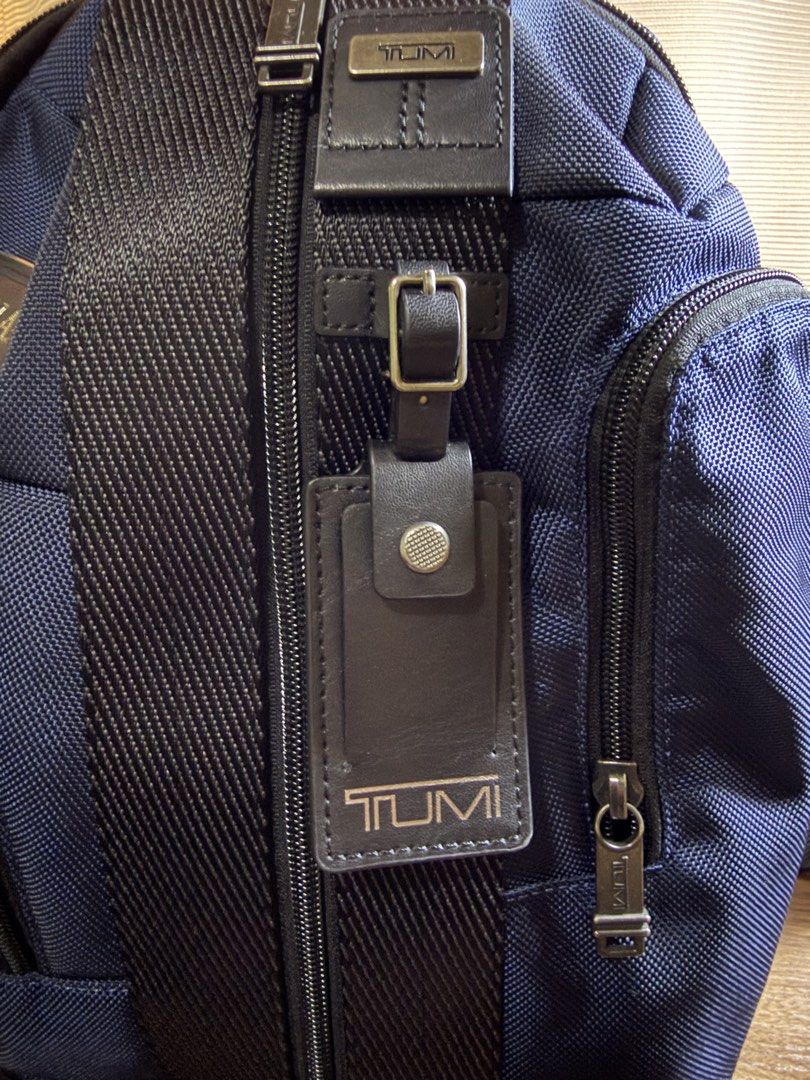 Tumi Higgins Sling (Category: Luxury Bags & Wallets) located in Quezon City. Submitted by nicoandjujie (Listing ID 1463183890, Image 3). Description: Up for sale is an authentic Tumi Higgins Sling in a Navy Blue tone. Lightly used in excellent condition. Clean interior and exterior; zippers and hardware function smoothly. Reason for selling: Bought this thinking it would fit like a lightweight sling, but it’s a bit too big for my setup. Price is 
