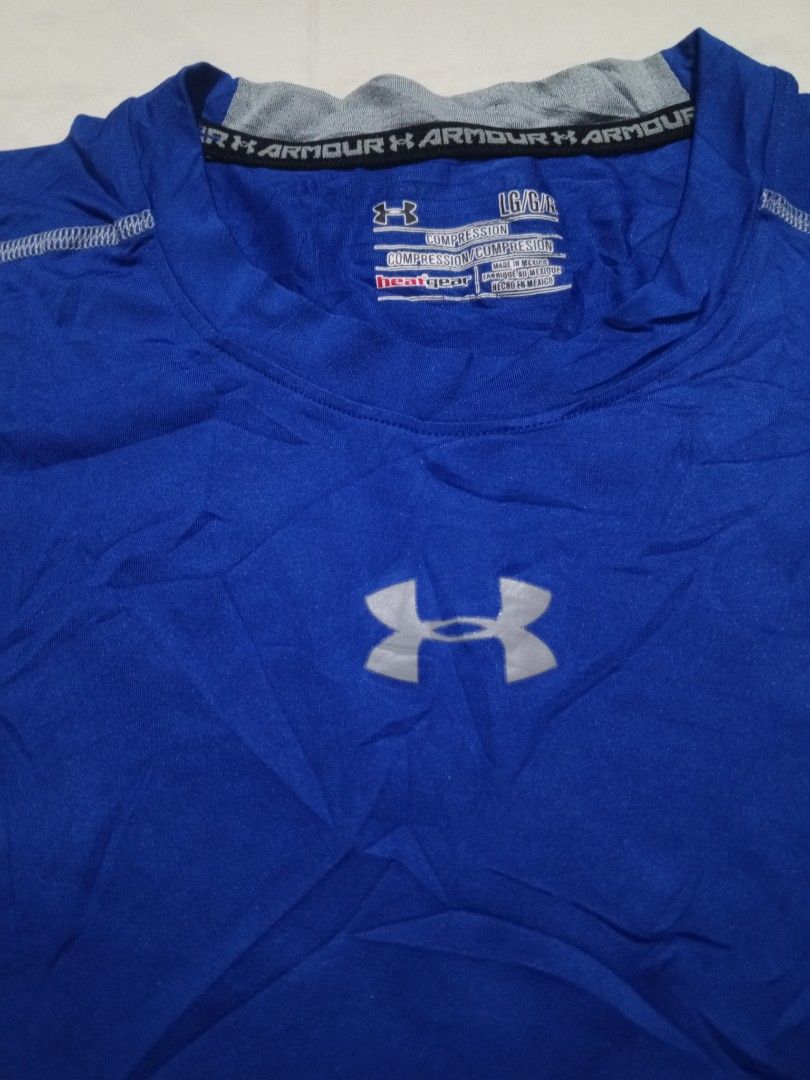 Under armour compression Sando (Category: Activewear) located in Santa Maria. Submitted by paulo-garcia21 (Listing ID 1463126136, Image 2). Description: large on tag 17.5 by 25.5 hairline cracks.