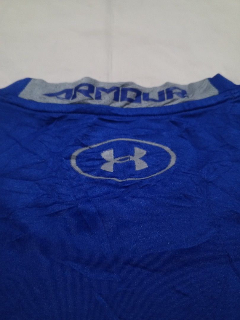 Under armour compression Sando (Category: Activewear) located in Santa Maria. Submitted by paulo-garcia21 (Listing ID 1463126136, Image 3). Description: large on tag 17.5 by 25.5 hairline cracks.