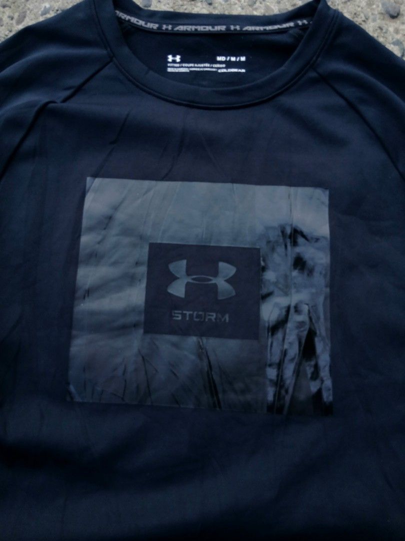 Under Armour Storm Long Sleeve Shirt M (Category: Tshirts & Polo Shirts ) located in Padada. Submitted by kinvillanu20604 (Listing ID 1463215768, Image 2). Description: - Under Armour Storm Long Sleeve Shirt - Size: Medium - Color: Black - Features Under Armour logo and Storm branding on front - Built with Under Armour ColdGear technology - Ideal for workouts and casual wear.