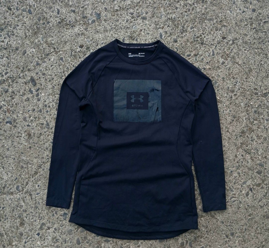 Under Armour Storm Long Sleeve Shirt M (Category: Tshirts & Polo Shirts ) located in Padada. Submitted by kinvillanu20604 (Listing ID 1463215768, Image 1). Description: - Under Armour Storm Long Sleeve Shirt - Size: Medium - Color: Black - Features Under Armour logo and Storm branding on front - Built with Under Armour ColdGear technology - Ideal for workouts and casual wear.