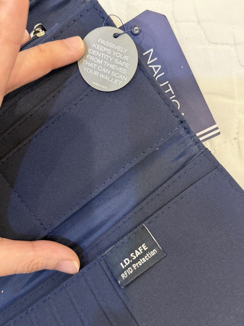 Nautica Money Manager Slim RFID Blocking Flap Wallet (Category: Wallets & Card holders) located in Manila. Submitted by youngrabbit.b5670d (Listing ID 1463277099, Image 3). Description: Original from USA Never used With tags Minor rubs due to long storing (see last pic).