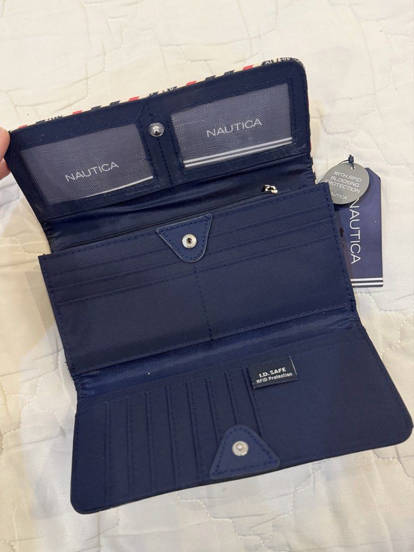 Nautica Money Manager Slim RFID Blocking Flap Wallet (Category: Wallets & Card holders) located in Manila. Submitted by youngrabbit.b5670d (Listing ID 1463277099, Image 2). Description: Original from USA Never used With tags Minor rubs due to long storing (see last pic).