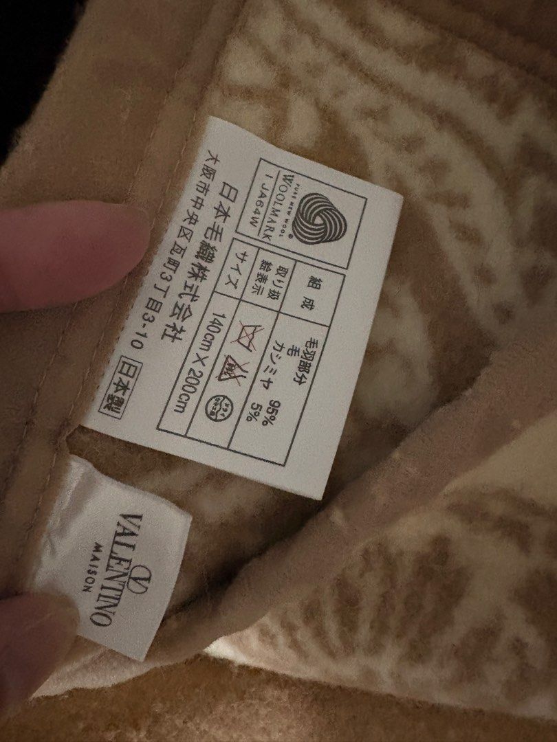 Valentino Maison Wool Blanket 140x200cm (Category: Bedding & Towels) located in Quezon City. Submitted by bluefrenchorn (Listing ID 1463173910, Image 2). Description: - Valentino Maison Blanket - Made in Japan - Material: 95% Wool, 5% Cashmere - Size: 140cm x 200cm - Features a beautiful pattern - Ideal for keeping warm.