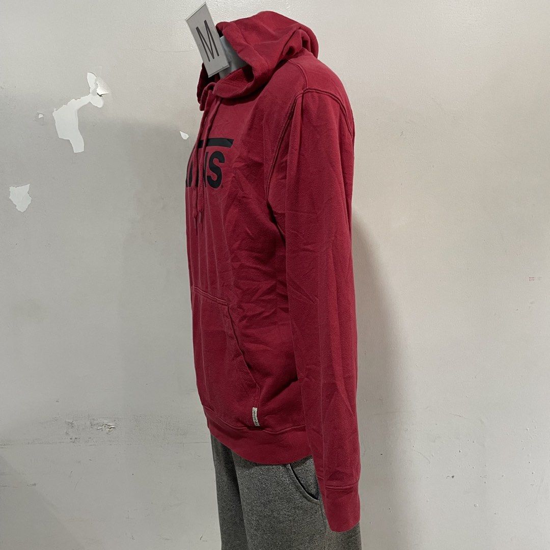 Vans Red Hoodie Size M (Category: Hoodies) located in Paombong. Submitted by purefire_ec18f9 (Listing ID 1463152616, Image 3). Description: - Classic red Vans hoodie - Features iconic Vans logo on the front - Front pocket for convenience - Adjustable drawstrings for the hood - Made in Vietnam - Ideal for casual wear.